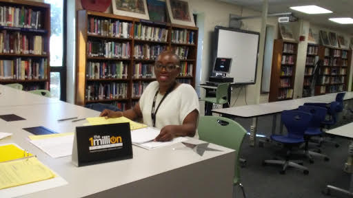 Ms.perry of garinger high "im glad to be helping students in need ."
